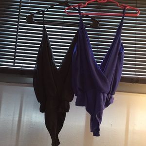 Royal blue and black body suits.